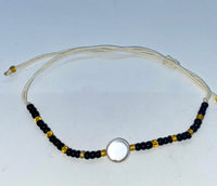 Bracelet with Beads and Pendant from Shell