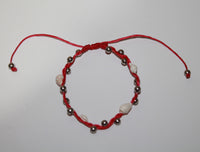 Bracelet With 4 Shell Wax Cord