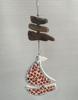 Mosaic boat and driftwood mobile